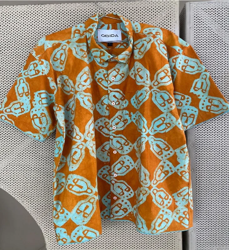 MASK BLUE AND ORANGE SHIRT